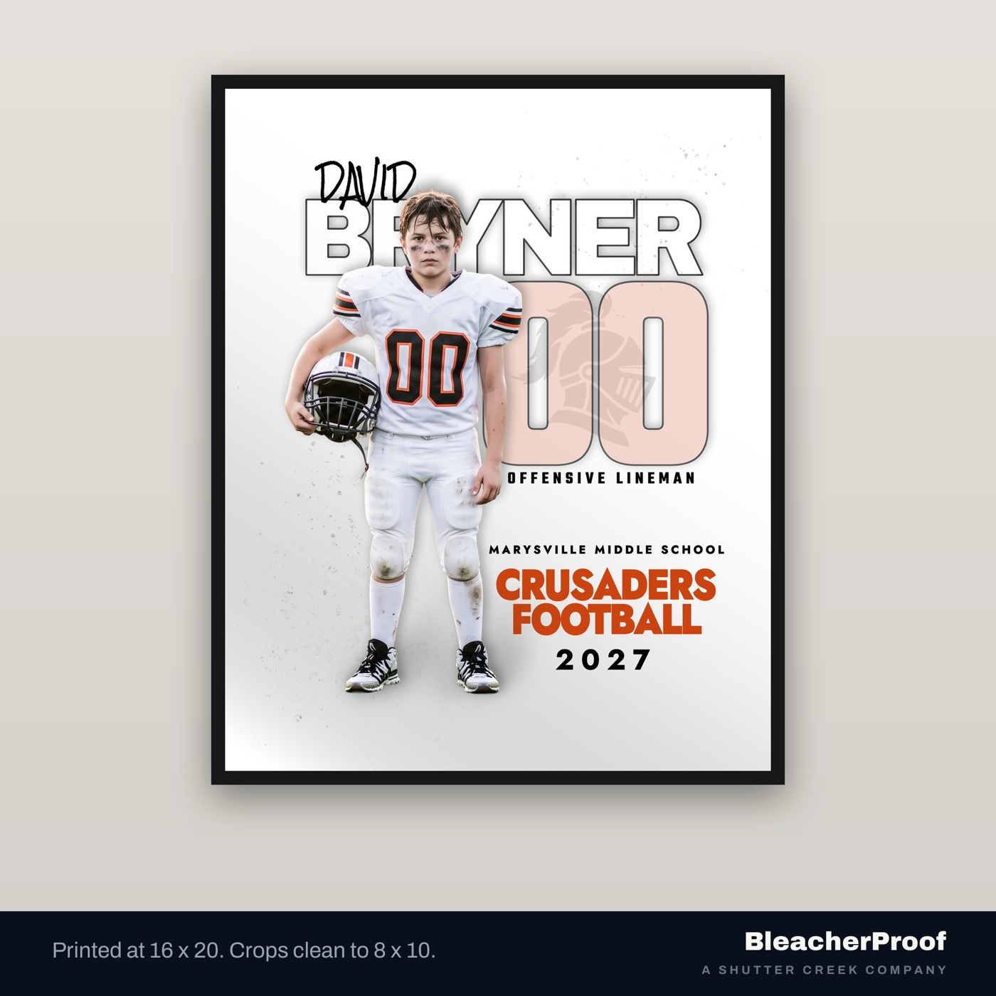 Football player poster printed and framed on a wall